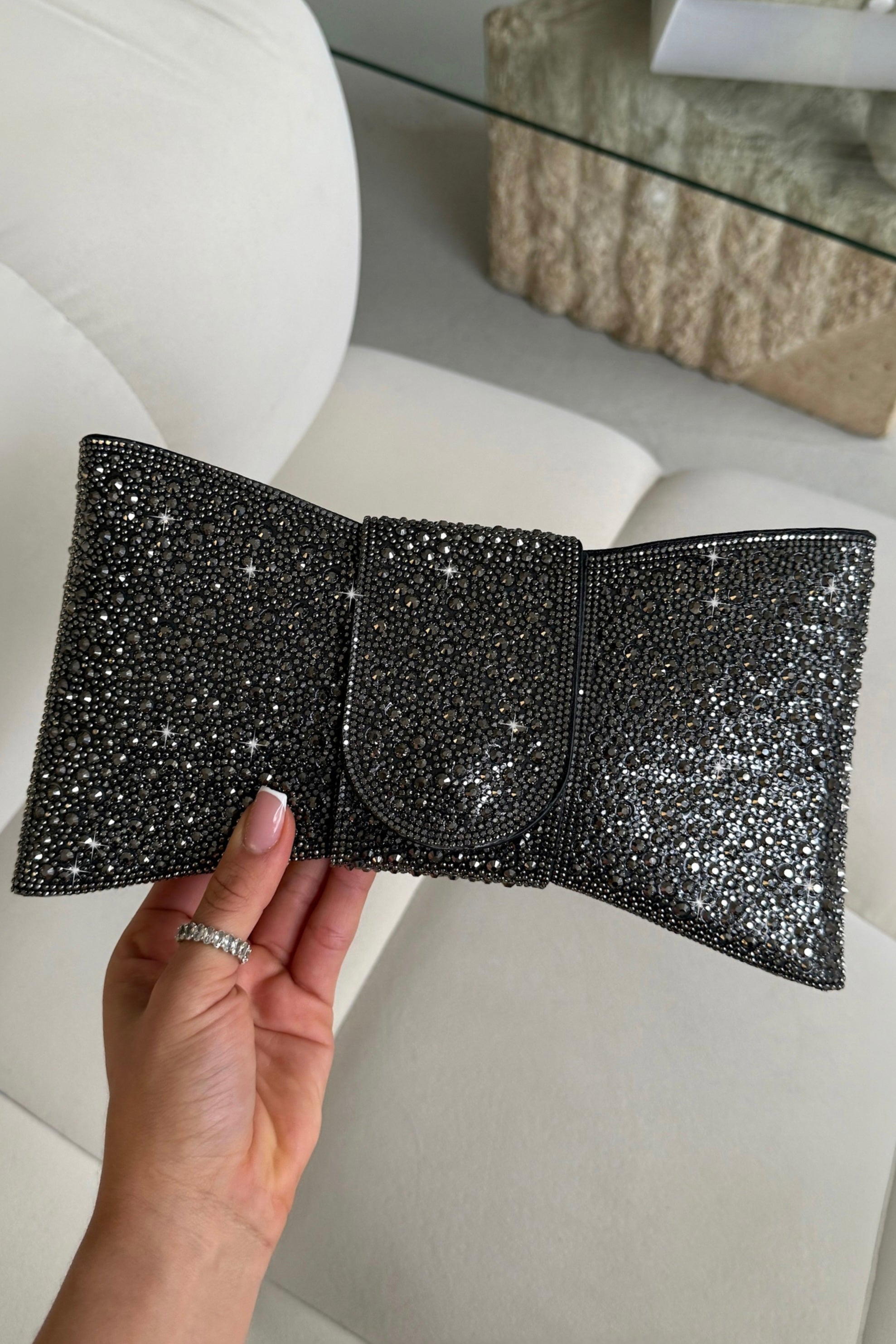 Crystal Luxe Bow Clutch Bag Black with statement bow silhouette