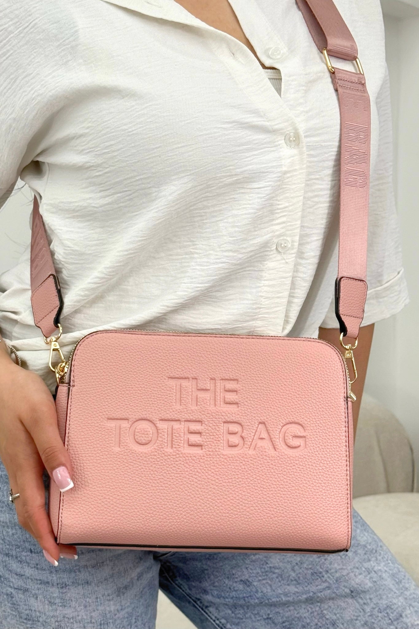 Faux Leather Triple Compartment Everyday Crossbody Tote Bag Baby Pink featuring structured silhouette with modern embossed slogan detail