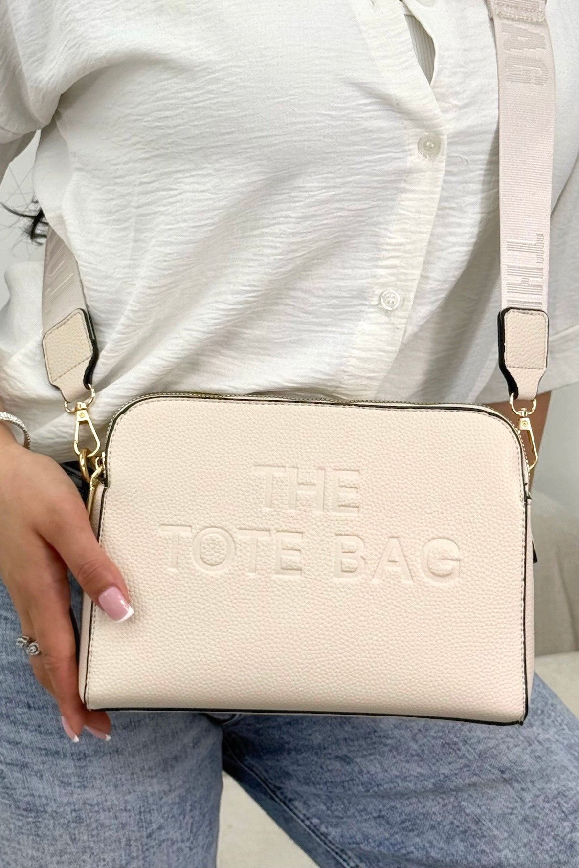 Faux Leather Triple Compartment Everyday Crossbody Tote Bag Nude designed with structured silhouette with modern embossed slogan detail