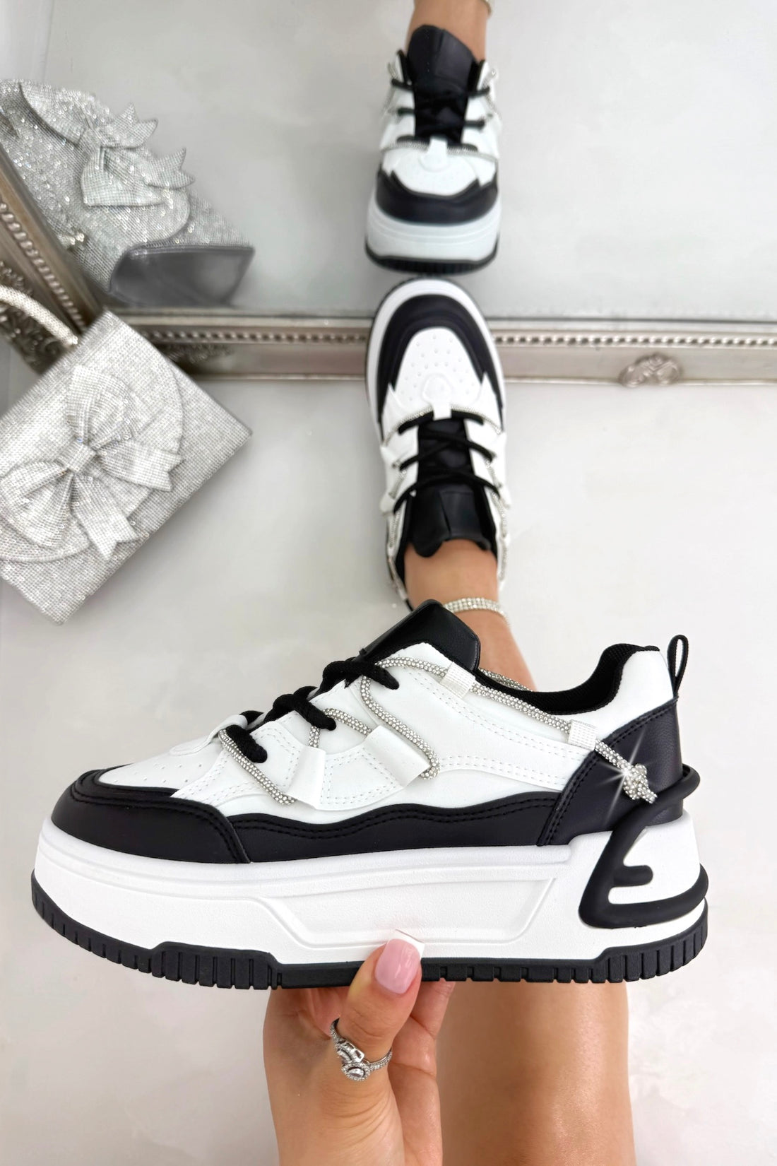 Crystal Spark Trainers Black and White, bringing attention to rope-style laces with sparkly threading