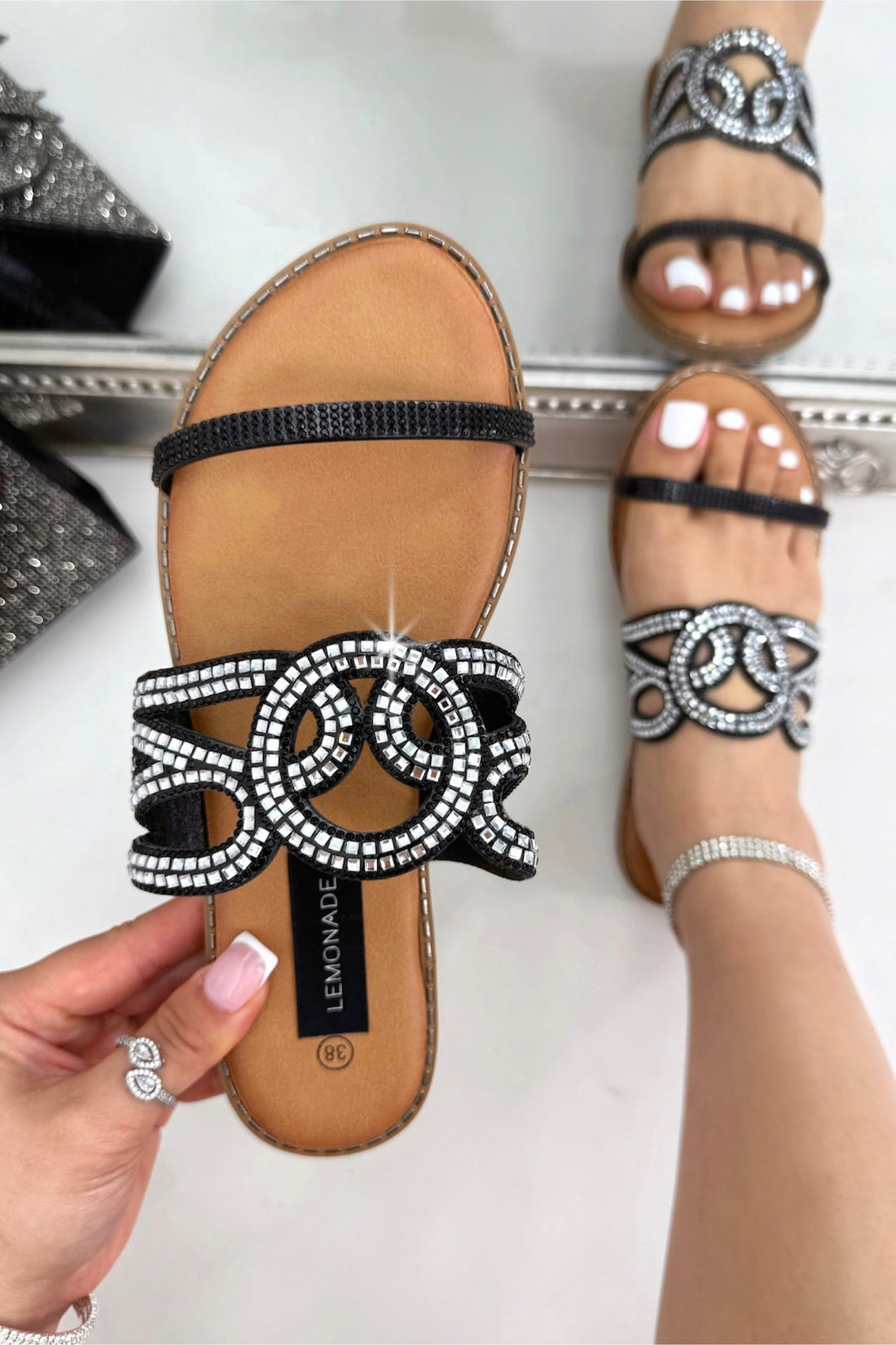 Crystal Amalfi Knot Sliders Black, shown from another angle