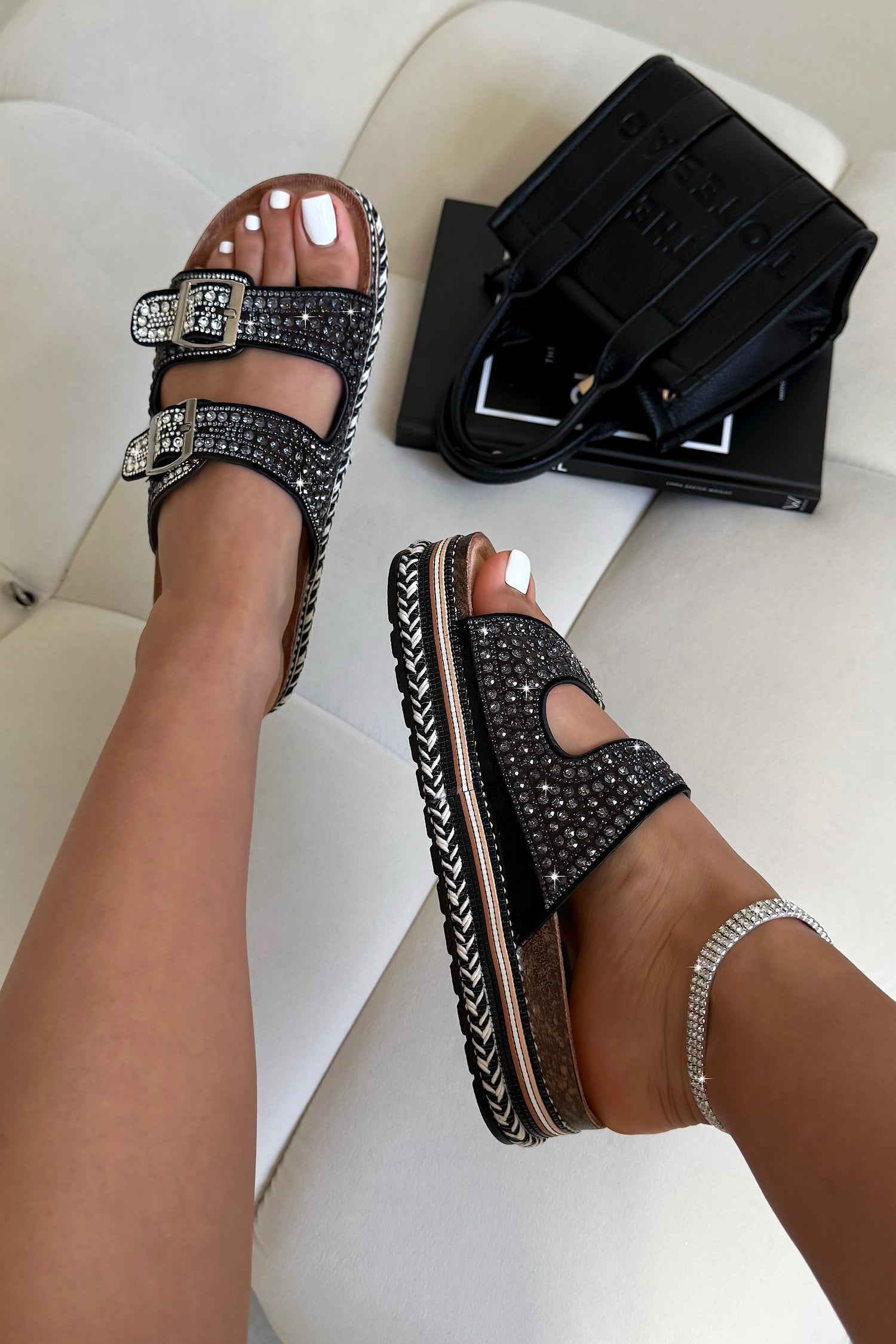 Crystal Riviera Double Buckle Sliders Black, bringing attention to statement buckle detailing