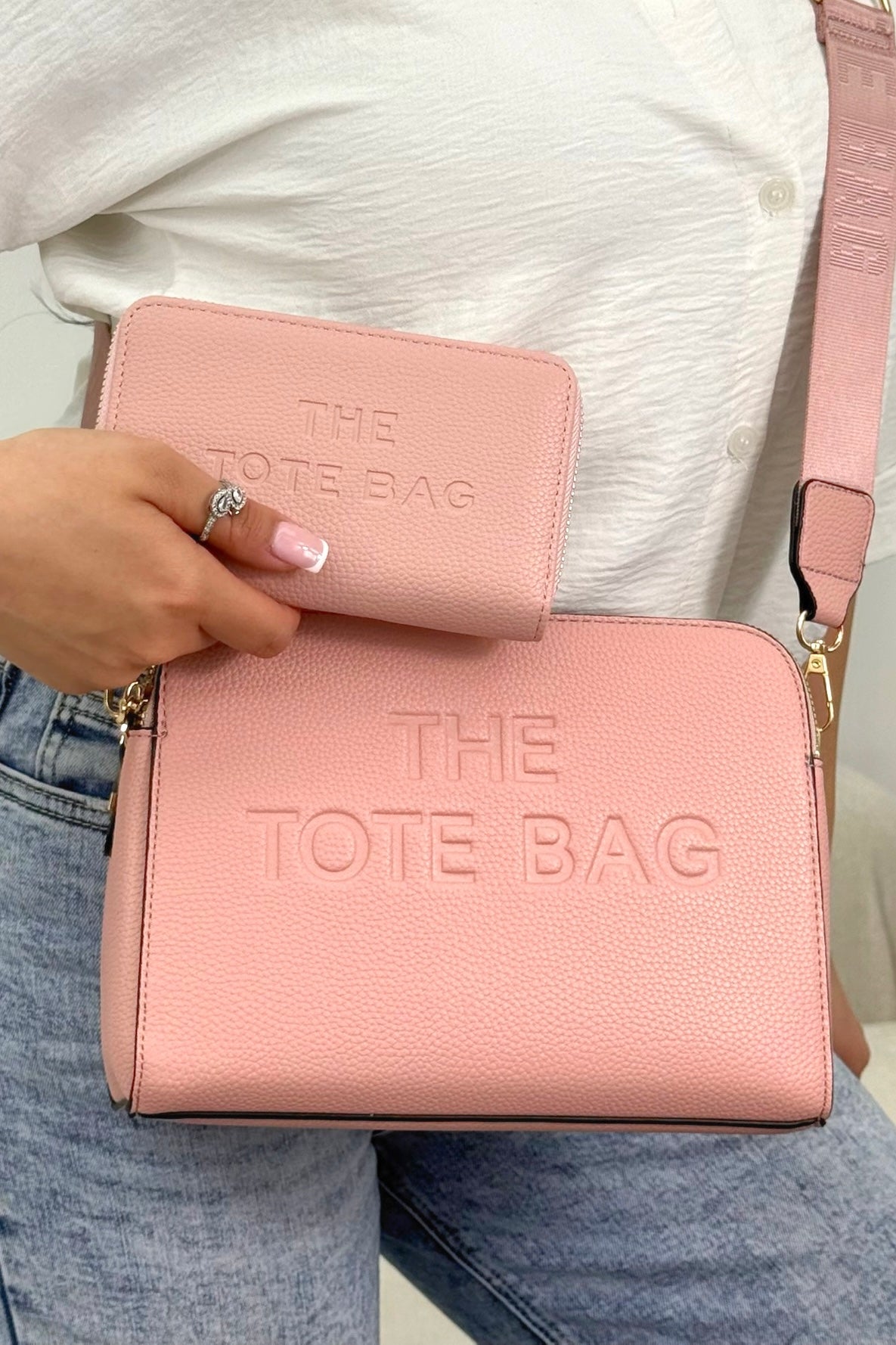 Faux Leather Triple Compartment Everyday Crossbody Tote Bag &amp; Faux Leather Everyday Wallet Tote Purse Baby Pink Bundle with structured silhouette with modern embossed slogan detail