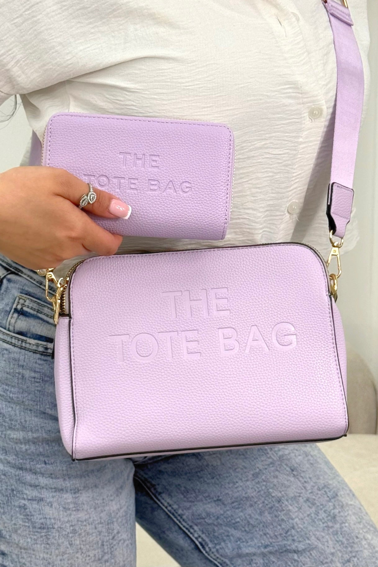 Faux Leather Triple Compartment Everyday Crossbody Tote Bag &amp; Faux Leather Everyday Wallet Tote Purse Lilac Bundle designed with structured silhouette with modern embossed slogan detail