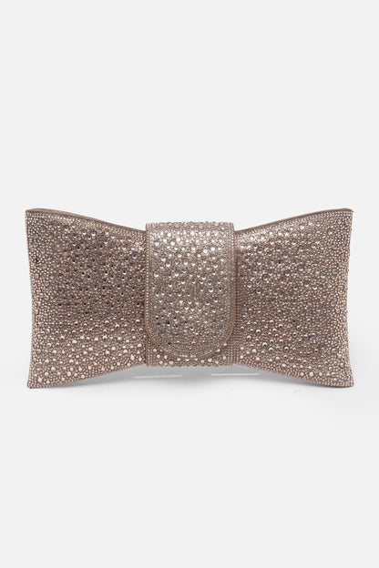 Crystal Luxe Bow Clutch Bag Rose Gold, drawing attention to magnetic flap fastening